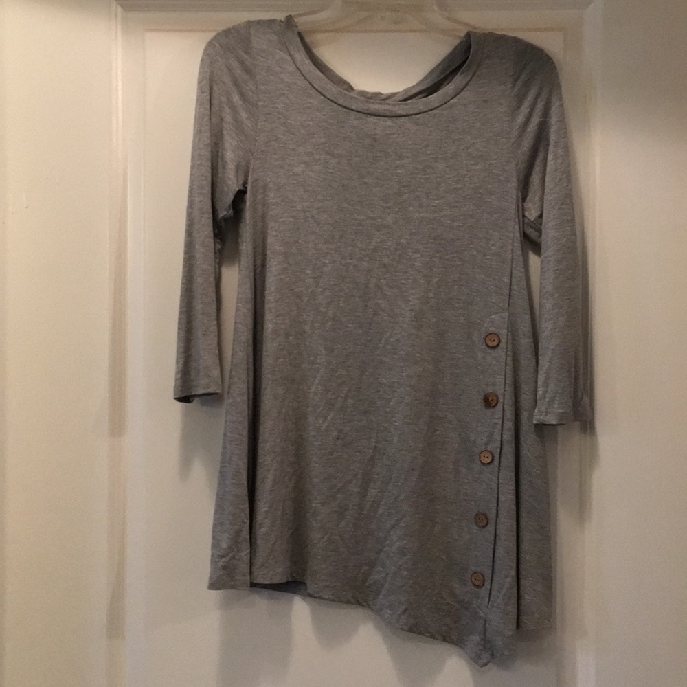 Gray top with accent buttons down the left side.